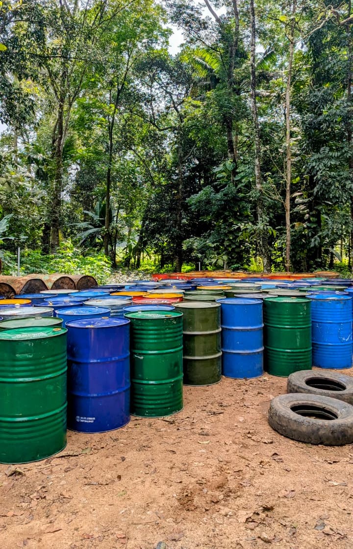 Kodumpidy Latex rubber collection barrels and facility in Kerala